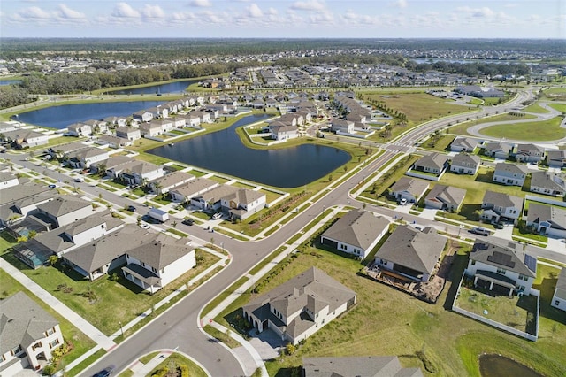 aerial view featuring a residential view and a water view