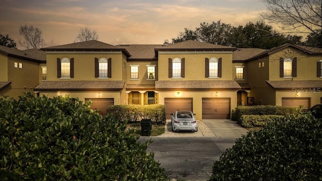 view of front of property with a garage