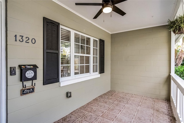 balcony with ceiling fan and covered porch