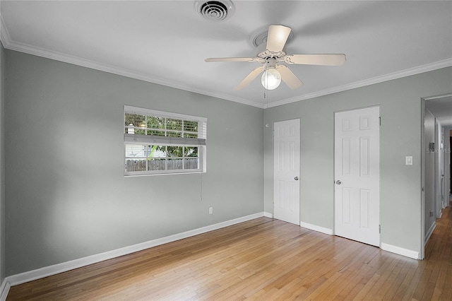 unfurnished bedroom with crown molding, ceiling fan, and light hardwood / wood-style floors