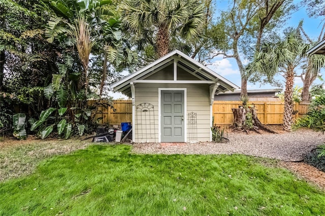 view of outdoor structure with a lawn