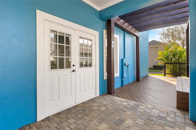 doorway to outside with brick floor