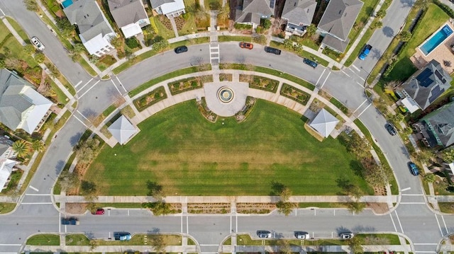 birds eye view of property with a residential view