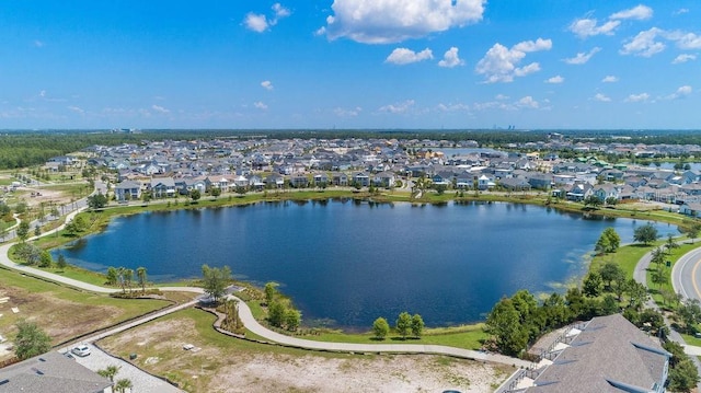 birds eye view of property with a residential view and a water view