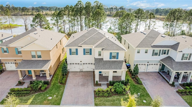 bird's eye view with a water view