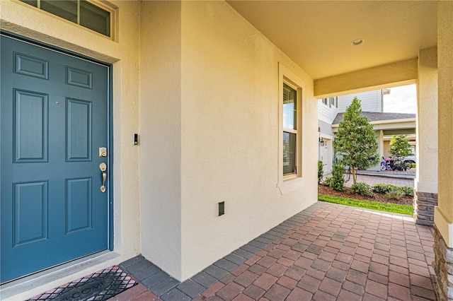 property entrance featuring covered porch