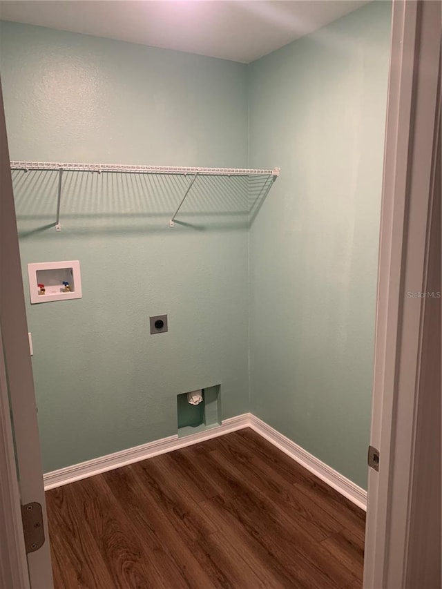 laundry room with hardwood / wood-style flooring, washer hookup, and hookup for an electric dryer