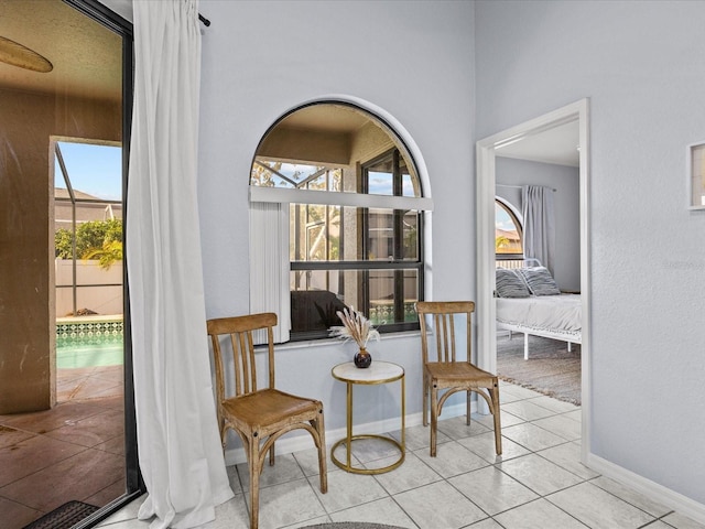 sitting room with light tile patterned floors