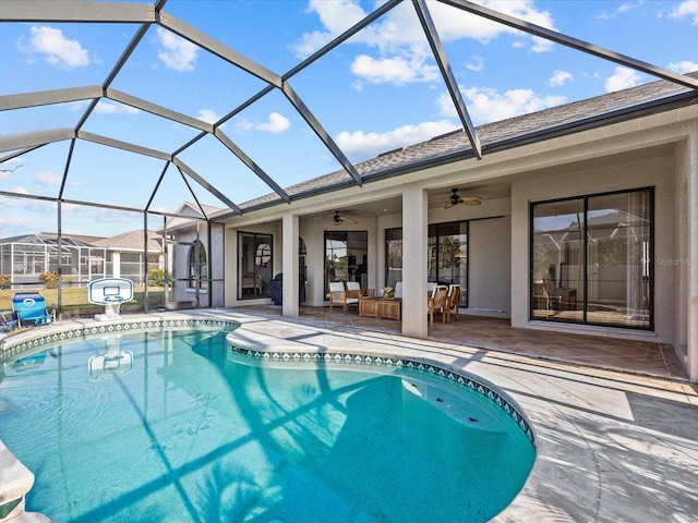 view of swimming pool featuring an outdoor hangout area, ceiling fan, a lanai, and a patio area