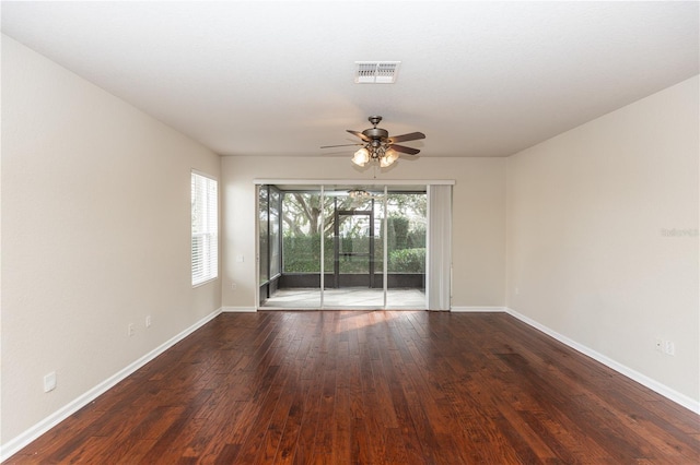 spare room with ceiling fan and hardwood / wood-style floors