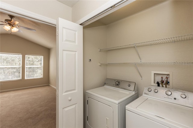 washroom featuring ceiling fan, independent washer and dryer, and light carpet