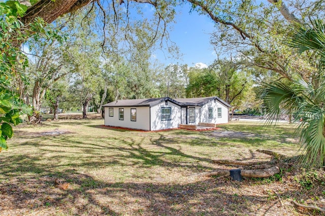 exterior space featuring a front lawn