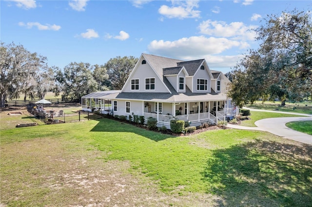 exterior space featuring a porch and a front lawn