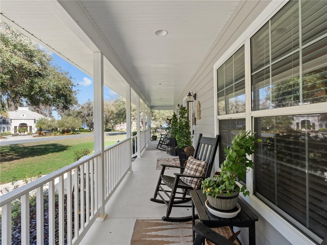 view of patio featuring a porch