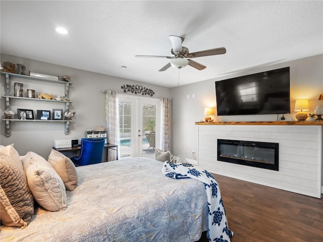 bedroom with french doors, dark hardwood / wood-style floors, access to exterior, and a textured ceiling