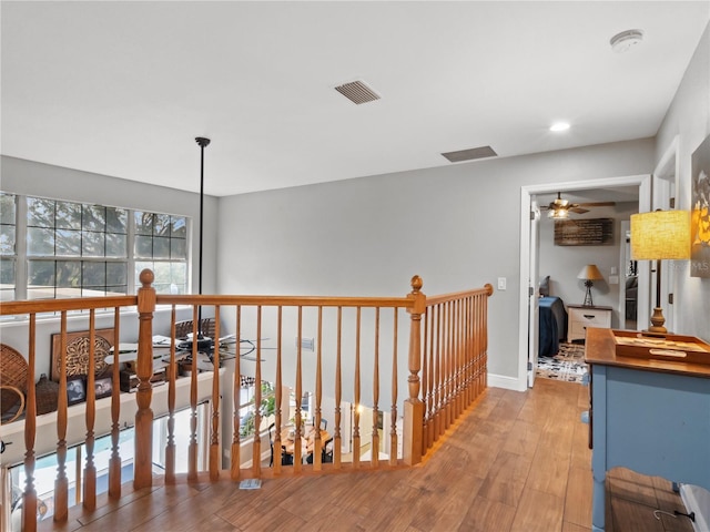 hallway featuring hardwood / wood-style floors