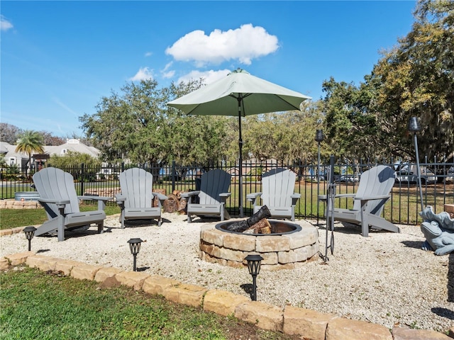 exterior space with an outdoor fire pit