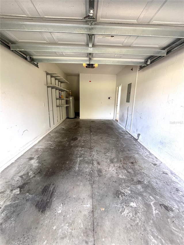 garage featuring a garage door opener, electric panel, and water heater