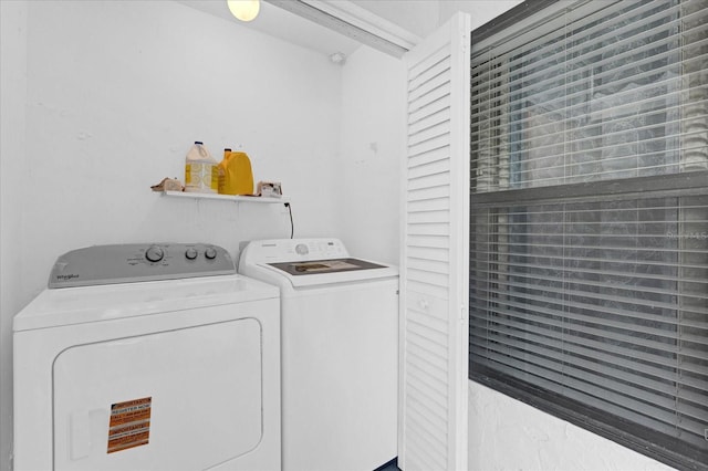 clothes washing area with laundry area and washing machine and dryer