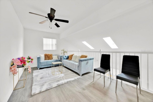 5108 Avignon Ct, Orlando, FL 32839 - living area featuring a skylight, wood finished floors, and ceiling fan