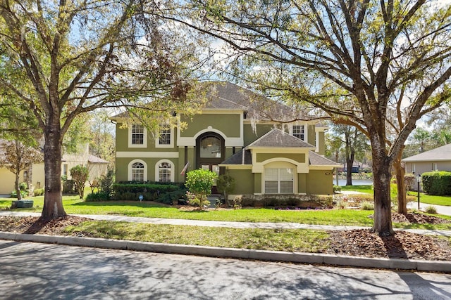 view of front of house featuring a front lawn