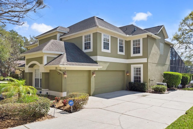 view of front of property featuring a garage