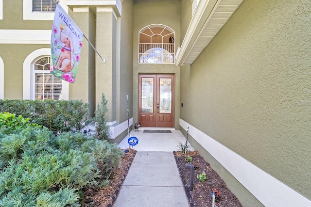 doorway to property featuring french doors