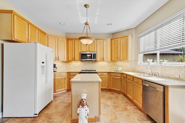 kitchen with stainless steel appliances, a kitchen island, decorative backsplash, and decorative light fixtures