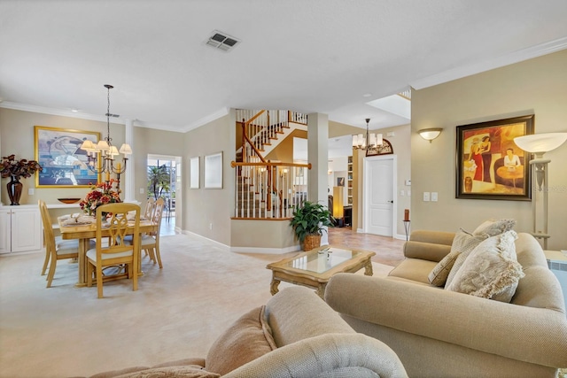 living room featuring ornamental molding, light colored carpet, and an inviting chandelier