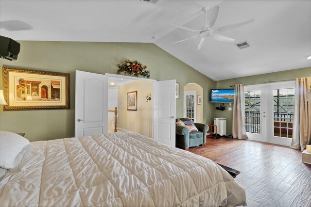 bedroom featuring lofted ceiling, access to outside, light hardwood / wood-style floors, and ceiling fan