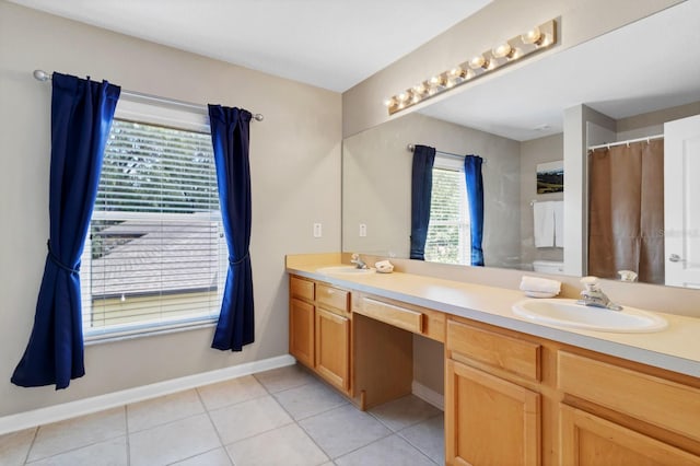 bathroom featuring vanity and tile patterned flooring