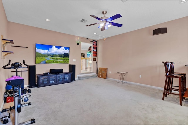 interior space with ceiling fan and carpet floors