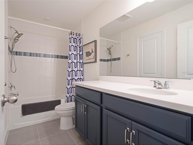 bathroom with toilet, visible vents, vanity, tile patterned floors, and shower / bath combo with shower curtain