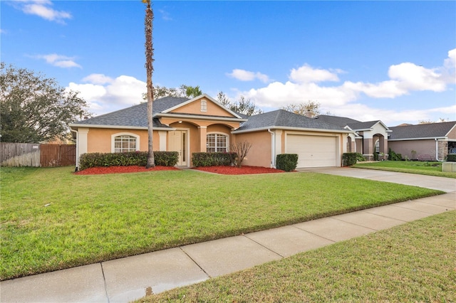 ranch-style house featuring a garage and a front lawn