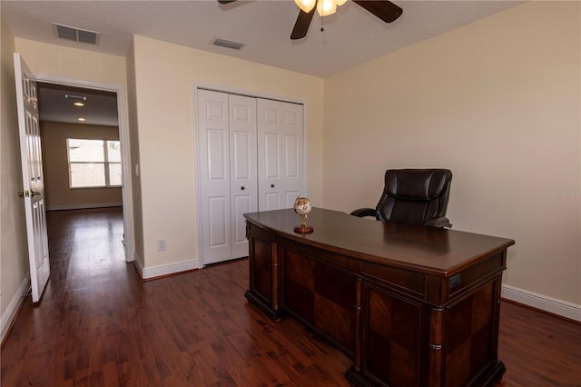 office space with ceiling fan and dark hardwood / wood-style flooring