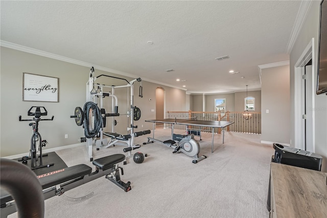 7515 John Hancock Dr, Winter Garden, FL 34787 - workout area featuring a textured ceiling, baseboards, ornamental molding, and visible vents