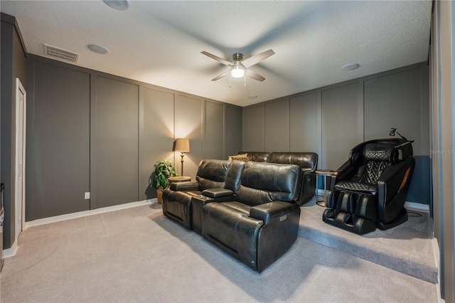 7515 John Hancock Dr, Winter Garden, FL 34787 - cinema room with light carpet, a decorative wall, visible vents, and a ceiling fan