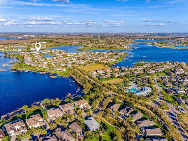7515 John Hancock Dr, Winter Garden, FL 34787 - bird's eye view with a water view and a residential view