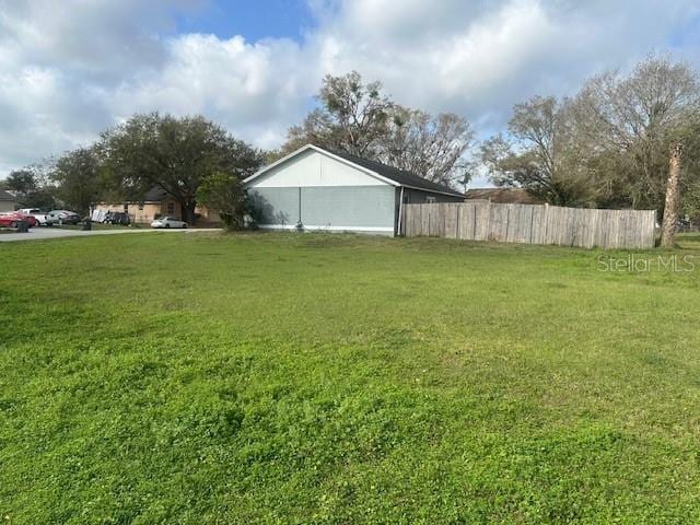 view of yard featuring fence