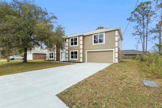 view of front of house featuring a garage, fence, concrete driveway, stucco siding, and a front yard