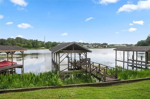 dock area featuring a water view