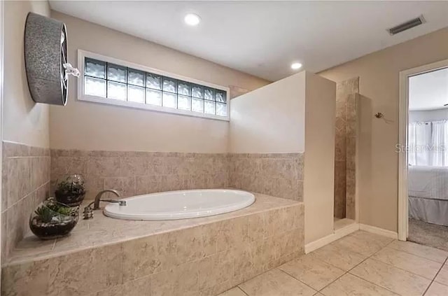 bathroom featuring recessed lighting, visible vents, a bath, tile patterned floors, and walk in shower