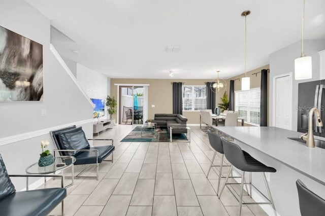 9017 Dogleg Dr, Davenport, FL 33896 - interior space featuring a notable chandelier