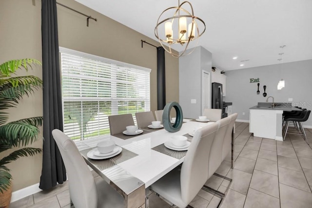 9017 Dogleg Dr, Davenport, FL 33896 - dining area with recessed lighting, a notable chandelier, light tile patterned flooring, and baseboards