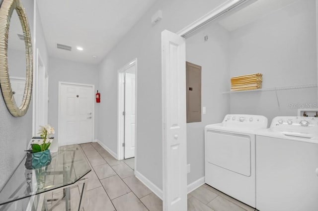 9017 Dogleg Dr, Davenport, FL 33896 - washroom with visible vents, baseboards, electric panel, laundry area, and independent washer and dryer