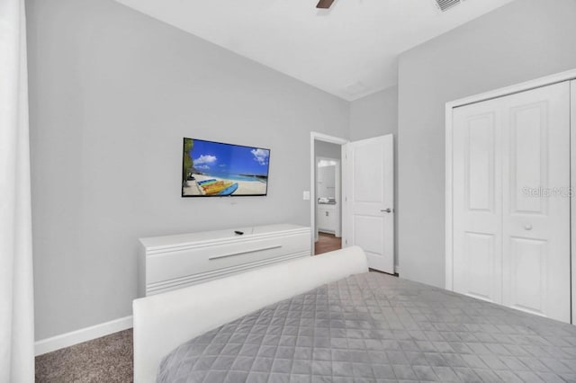 9017 Dogleg Dr, Davenport, FL 33896 - bedroom featuring carpet flooring, a ceiling fan, baseboards, and a closet