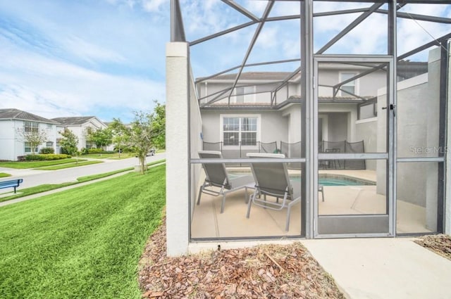 9017 Dogleg Dr, Davenport, FL 33896 - exterior space featuring a lanai, a lawn, a chimney, and stucco siding