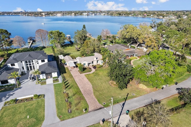 bird's eye view featuring a water view and a residential view