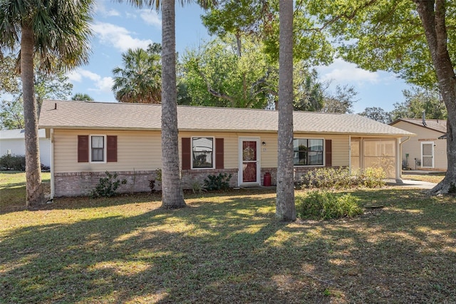 single story home featuring a front yard