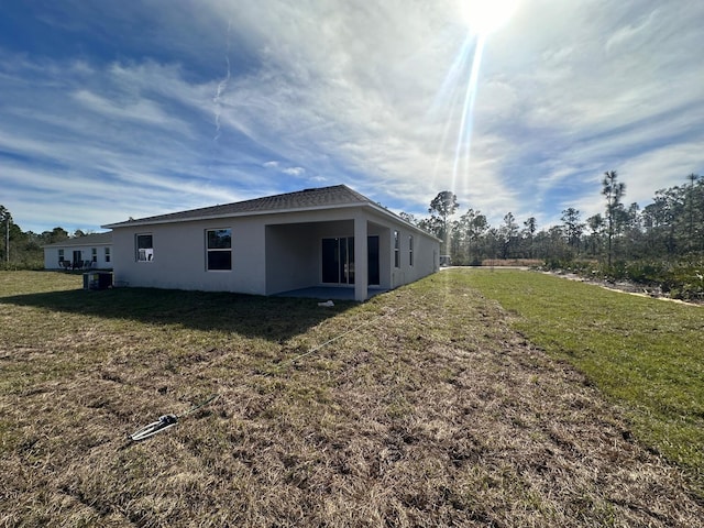 exterior space featuring a lawn